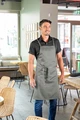 Jobeline Botero Bib Apron, light-grey, 88x100 cm, 65% Polyester 35% Cotton, 200 g/m², Crossed Back Straps, Tablet Pocket, Pen Tab, Washable at 60°C