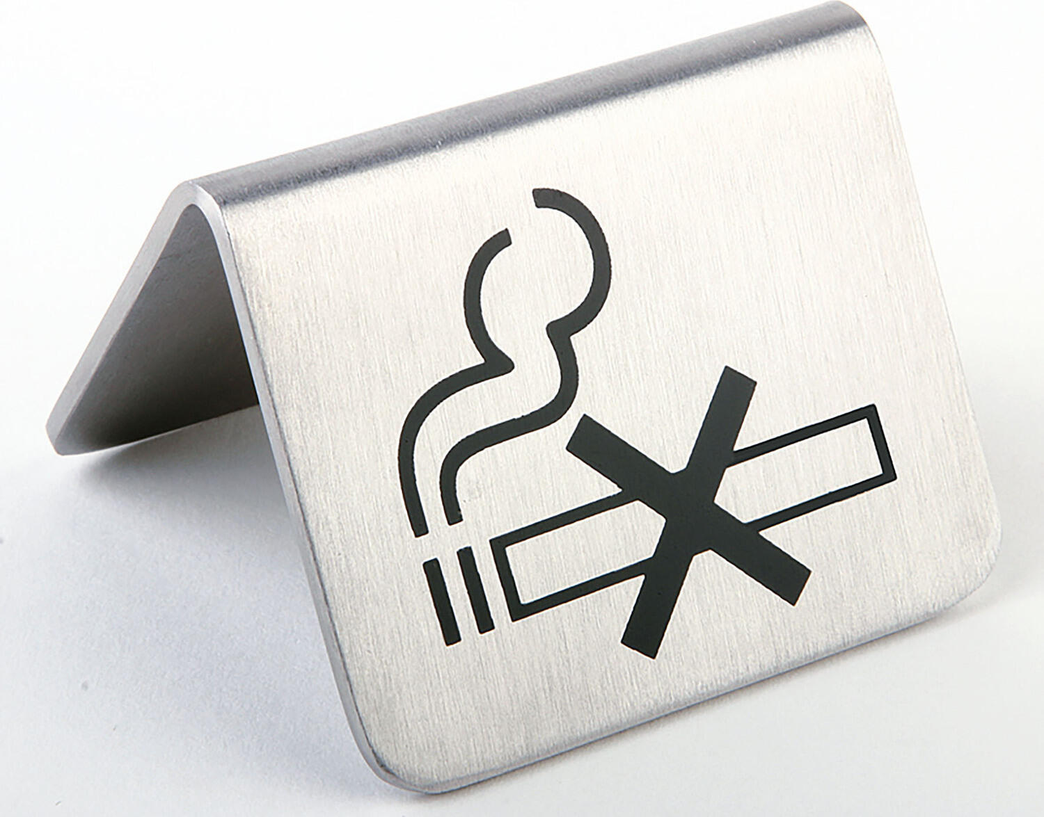 APS Assheuer + Pott GmbH & Co. KG Table sign Tischaufsteller Rauchverbot Table sign; 5.5x5.5x3.5 cm (LxWxH); stainless steel; 2 piece / pack Tischaufsteller Rauchverbot; 5.5x5.5x3.5 cm (LxBxH); edelstahl; 2 Stück / Pack Stainless steel table display with the motif "No smoking". Der Tischaufsteller ist eine dezente und praktische Lösung zur klaren Kennzeichnung von Nichtraucherbereichen. Durch das beidseitige Symbol ist der Hinweis aus verschiedenen Blickrichtungen gut erkennbar und eignet sich ideal für Gastronomie, Hotellerie, Empfangsbereiche, Veranstaltungen oder private Räume. Die mattierte Ausführung wirkt gepflegt und professionell. Das robuste Material ist für den regelmäßigen Einsatz bestens geeignet. * Material: Edelstahl * Beidseitiges Nichtraucher-Symbol * Zur Kennzeichnung von Nichtraucherbereichen geeignet * Ideal für Gastronomie, Hotellerie und Veranstaltungen * Im praktischen Set * Stapelbar * Feucht abwischbar * Nicht spülmaschinengeeignet