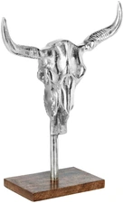 unknown LUSINI Solutions GmbH Decorative bull's head Aki Stierkopf Aufsteller Aki Decorative bull's head Aki; 25x32x10 cm (WxHxD); silver/brown Stierkopf Aufsteller Aki; 25x32x10 cm (BxHxT); silber/braun Aluminum bull's head decoration with durable base made of mango wood. Stierkopf Dekoelement aus Aluminium mit standfester Platte aus Mangoholz.
