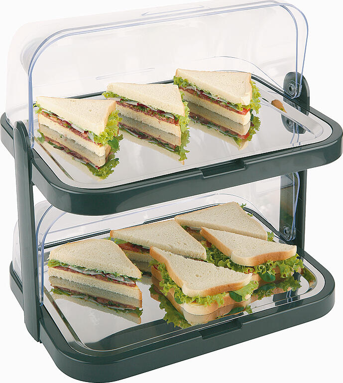APS Assheuer + Pott GmbH & Co. KG Buffet display case Buffet-Vitrine Doppeldecker Buffet display case; 44x32x44 cm (LxWxH); black/transparent; rectangular Buffet-Vitrine Doppeldecker; 44x32x44 cm (LxBxH); schwarz/transparent; rechteckig Plastic buffet display case with stainless steel trays. Roll-top hoods can be opened on both sides. Die Buffetvitrine DOPPELDECKER ist eine praktische Lösung zum hygienischen Präsentieren und Kühlen verschiedener Speisen auf mehreren Ebenen. Sie eignet sich ideal für Gebäck, Käse, Aufschnitt, Snacks, Desserts oder kleine Speisen in Gastronomie, Hotellerie, Catering und Selbstbedienungsbereichen. Die beidseitig zu öffnenden Rolltophauben ermöglichen einen komfortablen Zugriff und unterstützen einen reibungslosen Serviceablauf. * Material: ABS, 18/0 Edelstahl und SAN * Bestehend aus Basis, Tabletts, Rolltophauben und Kühlakkus * Mehrstufige Ausführung * Rolltophauben beidseitig zu öffnen * Zum hygienischen Präsentieren und Kühlen von Speisen * Für Buffet, Theke und Servierstation geeignet * Kühlbar * Spülmaschinengeeignet * Made in Germany