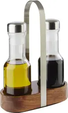APS Assheuer + Pott GmbH & Co. KG Vinegar & oil cruet WOOD Essig- & Öl-Menage WOOD Vinegar & oil cruet WOOD; 7.5x24.5 cm (WxH); brown/silver Essig- & Öl-Menage WOOD; 7.5x24.5 cm (BxH); braun/silber Matt polished, elegant design. The WOOD vinegar and oil cruet consists of a wooden base, a stainless steel handle and two glass containers with stainless steel lids and screw caps. Die Menage WOOD ist eine elegante Lösung zum Bereitstellen von Essig und Öl am gedeckten Tisch, im Restaurant oder im Frühstücksbereich. Die Kombination aus Akazienholz, Glas und mattiertem Edelstahl sorgt für eine hochwertige, natürliche Optik und eine professionelle Präsentation. Die praktische Basis hält die Behälter ordentlich zusammen, während die möbelschonende Unterseite empfindliche Oberflächen schützt. * Material: Akazienholz, Glas, 18/8 Edelstahl und Polyethylen * Set mit Basis sowie Essig- und Ölbehältern * Mit Ausgießern für kontrolliertes Dosieren * Für Restaurant, Frühstücksbereich und Tischservice geeignet * Möbelschonende Unterseite zum Schutz von Oberflächen * Feucht abwischbar
