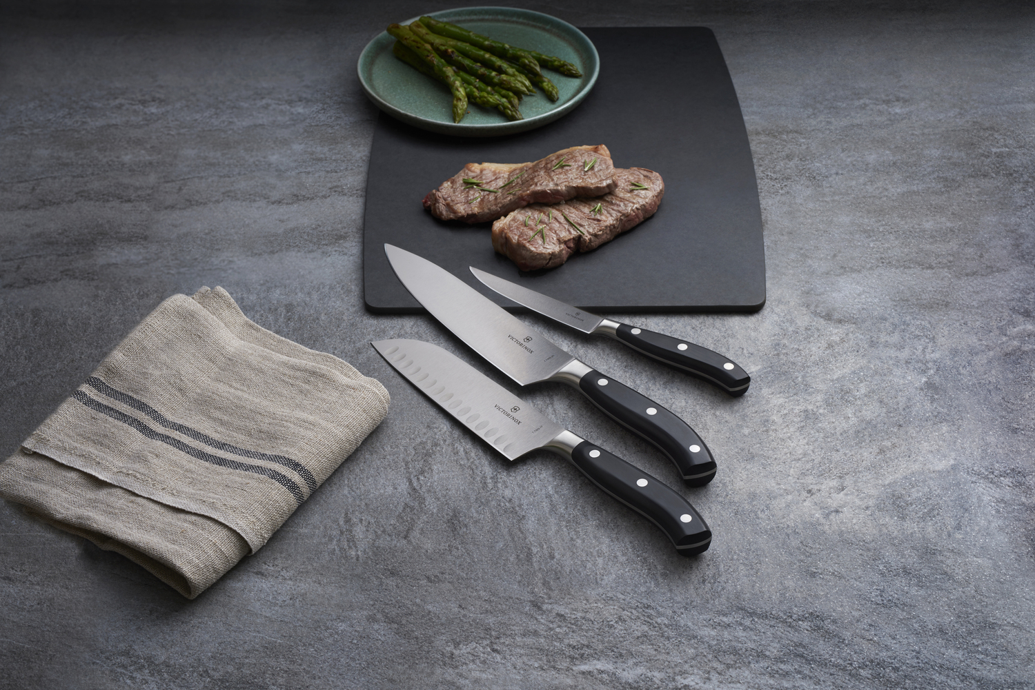Victorinox Grand Maître Santoku Knife 7.7323.17, 17 cm Forged Steel Blade with Granton Edge, Ergonomic Black POM Handle, Professional Kitchen Knife