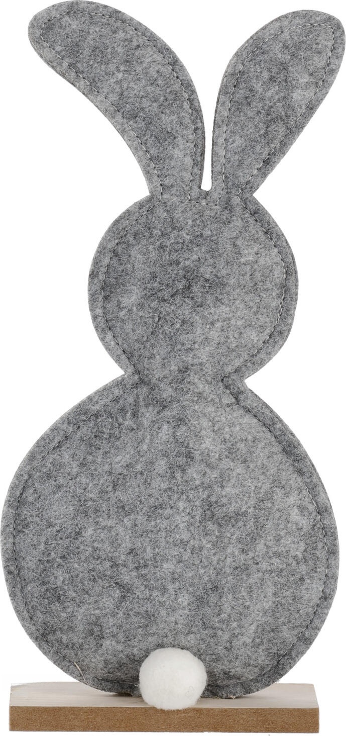 unknown LUSINI Solutions GmbH Easter bunny decoration Aldo Osterhasen-Aufsteller Aldo Easter bunny decoration Aldo; 12x4x26 cm (LxWxH); grey/brown Osterhasen-Aufsteller Aldo; 12x4x26 cm (LxBxH); grau/braun Easter bunny made of gray felt, with wooden base. Osterhase aus grauem Filz, mit Holzsockel.