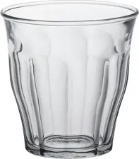 Duralex Duralex SCOP SA Universal glass Picardie Universalglas Picardie Universal glass Picardie; 130 ml, 7x7.5 cm (ØxH); transparent; 6 piece / pack Universalglas Picardie; 130 ml, 7x7.5 cm (ØxH); transparent; 6 Stück / Pack The Picardie glasses from Duralex in the filling sizes 130 ml to 580 ml are the ideal solution for professional use in restaurants, hotels, bars, cafeterias and canteens. Whether for small quantities of drinks such as espresso, digestifs or shots, medium portions such as water, soft drinks or juices or larger quantities for beer and long drinks - the Made in France glasses combine high impact resistance, durability and a timeless, simple look that blends effortlessly into any table setting. Versatile shape for everyday catering Picardie glasses are made from tempered soda-lime glass and are dishwasher-safe and temperature-resistant, making them ideal for professional catering. The classic, slightly conical shape sits comfortably in the hand and saves valuable storage space in the pantry and scullery - regardless of the glass size. Efficient, hygienic and sustainable Thanks to the neutral design, the glasses match different service lines and can be easily combined with each other. The high impact resistance reduces breakage, while the easy-care use in industrial dishwashers ensures hygienic standards. The glasses are also recyclable and durable, making them a sustainable solution for the catering industry. * Professional glass - space-saving and efficient in dishwashing processes * Tempered soda-lime glass - more shatterproof than standard crystal glass * dishwasher-safe up to 65 °C - ideal for everyday catering use * classic, neutral shape - suitable for any table setting * ergonomic design - easy to grip * Versatile use - ideal for espresso, digestifs, whiskey or water with espresso * Made in France - manufactured by Duralex, a traditional glass producer * Durable and sustainable - fully recyclable Die Picardie Gläser von Duralex in den Füllgrößen 130?ml bis 580?ml sind die ideale Lösung für den professionellen Einsatz in Restaurants, Hotels, Bars, Cafeterien und Kantinen. Ob kleine Getränkemengen wie Espresso, Digestifs oder Shots, mittlere Portionen wie Wasser, Softdrinks oder Säfte oder größere Mengen für Bier und Longdrinks – die Gläser Made in France kombinieren hohe Stoßfestigkeit, Langlebigkeit und eine zeitlos-schlichte Optik, die sich mühelos in jede Tischkultur integriert. Vielseitige Form für den Gastro-Alltag Die Picardie Gläser werden aus gehärtetem Kalk-Natron-Glas gefertigt und sind spülmaschinenfest sowie temperaturbeständig, wodurch sie den Anforderungen in der professionellen Gastronomie standhalten. Die klassische, leicht konische Form liegt gut in der Hand und spart wertvollen Stauraum in Lagerung und Spülküche – unabhängig von der Glasgröße. Effizient, hygienisch und nachhaltig Dank des neutralen Designs passen die Gläser zu verschiedenen Servicelinien und können problemlos miteinander kombiniert werden. Die hohe Stoßfestigkeit reduziert Bruchverluste, während der pflegeleichte Einsatz in gewerblichen Spülmaschinen hygienische Standards sicherstellt. Zusätzlich sind die Gläser recyclingfähig und langlebig, was sie zu einer nachhaltigen Lösung für die Gastronomie macht. * Profi-Glas – platzsparend und effizient in Spülprozessen * gehärtetes Kalk-Natron-Glas – bruchsicherer als Standard-Kristallglas * spülmaschinenfest bis 65?°C – ideal für den täglichen Gastro-Einsatz * klassische, neutrale Form – passend zu jeder Tischgestaltung * ergonomisches Design – einfach zu greifen * vielseitige Einsatzmöglichkeiten – ideal für Espresso, Digestifs, Whiskey oder Wasser zum Espresso * Made in France – hergestellt von Duralex, traditioneller Glasproduzent * langlebig und nachhaltig – vollständig recyclingfähig