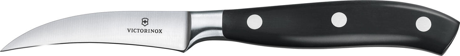 Victorinox Victorinox AG Touring knife Grand Maître, straight Tourniermesser Grand Maitre, gerade Touring knife Grand Maître, straight; Blade length 8 cm, 21 cm (L); silver/black Tourniermesser Grand Maitre, gerade ; Klingenlänge 8 cm, 21 cm (L); silber/schwarz GRAND MAÎTRE RELIABLE CRAFTSMANSHIP LEADS TO ENJOYMENT - Forged from a single piece and evenly hardened - Perfect balance for comfort at work - Timeless, durable design Balance and equilibrium: this is the credo of the Grand Maître collection, which is appreciated by professional and amateur chefs alike. Each model in the popular series has been forged from a single forged from a single piece and evenly hardened. This manufacturing method guarantees a seamless transition from handle to blade and greater control and precision with every cut. The ergonomically shaped handle also offers optimum comfort over a long period of time. A kitchen tool that pays for itself every day. Handle material: Polyoxymethylene is robust, hard and retains its dimensional stability even at high temperatures. It is highly abrasion-resistant, can be sterilized and is suitable for temperatures up to 130°C. GRAND MAÎTRE ZUVERLÄSSIGE HANDWERKSKUNST FÜHRT ZUM GENUSS - Aus einem Stück geschmiedet und gleichmäßig gehärtet - Perfekte Balance für Komfort bei der Arbeit - Zeitloses, langlebiges Design Ausgewogenheit und Balance: Das ist das Credo der Grand Maître Kollektion, die Profi- und Hobbyköche gleichermaßen zu schätzen wissen. Jedes Modell der beliebten Serie wurde aus einem einzigen Stück geschmiedet und gleichmäßig gehärtet. Diese Fertigungsmethode garantiert einen nahtlosen Übergang vom Griff zur Klinge und höhere Kontrolle und Präzision bei jedem Schnitt. Außerdem bietet der ergonomisch geformte Griff auch über lange Zeit optimalen Komfort. Ein Küchenwerkzeug, das sich täglich bezahlt macht. Material Griff: Polyoxymethylen ist robust, hart und behält seine dimensionale Stabilität auch bei hohen Temperaturen bei. Es ist sehr abriebfest, kann sterilisiert werden und ist für Temperaturen bis zu 130 °C geeignet.