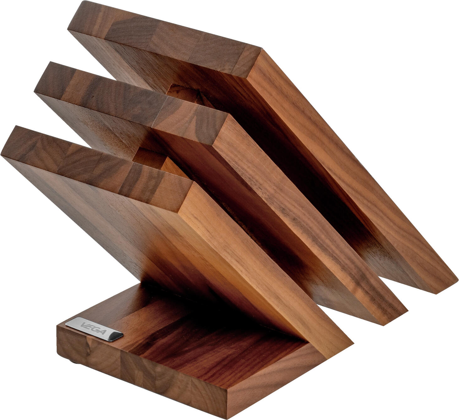 VEGA LUSINI Solutions GmbH Knife block Dante Messerblock Dante Knife block Dante; 23.5x12.5x21 cm (LxWxH); walnut natural Messerblock Dante; 23.5x12.5x21 cm (LxBxH); walnuss natur Eye-catching magnetic knife block in slanted fan look made of oiled walnut wood with eye-catching grain pattern. Magnets throughout the knife block, so that knife blades can be held securely in place on all sides. Soft feet on the bottom protect the kitchen countertop. For natural wood, gentle cleaning by hand is recommended. Ausgefallener magnetischer Messerblock in schräger Fächer-Optik aus geöltem Wallnussholz mit prägnanter Maserung. Mit Magneten duchzogen, sodass an allen Seiten Messerklingen fest anhaften können. Weiche Füßchen auf der Unterseite schonen die Küchen-Arbeitsplatte. Bei Naturholz empfiehlt sich schonende Handreinigung.