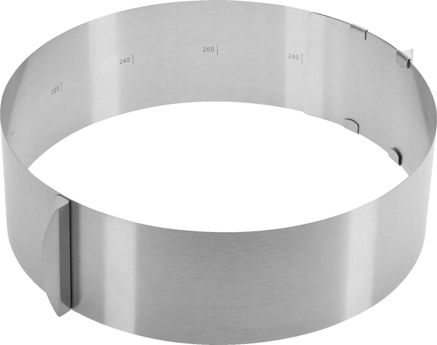 Westmark Westmark GmbH Cake ring Classic adjustable Tortenring Classic verstellbar Cake ring Classic adjustable; 30x8.5 cm (ØxH); silver; round Tortenring Classic verstellbar; 30x8.5 cm (ØxH); silber; rund Cake ring made of high quality stainless steel. Adjustable (16 - 30 cm) and extra high (height: 8.5 cm). With scale. For baking, shaping and layering cakes and pies. Easy to open/close mold rim with practical handles allows easy release of the baked goods as well as dimensionally stable layering and decorating of multiple layers. Heat resistant up to 240 °C. The ring is easy to clean by hand. Suitable for dishwashers. Tortenring aus hochwertigem, rostfreiem Edelstahl. Variabel verstellbar (16 - 30 cm) und besonders hoch (Höhe: 8,5 cm). Mit Skala. Zum Backen, Formen und Schichten von Kuchen und Torten. Leicht zu öffnender / schließender Formrand mit praktischen Griffen ermöglicht ein einfaches Auslösen des Backgutes sowie ein formstabiles Schichten und Dekorieren mehrerer Böden. Hitzebeständig bis 240 °C. Der Ring lässt sich einfach von Hand reinigen. Spülmaschinengeeignet.