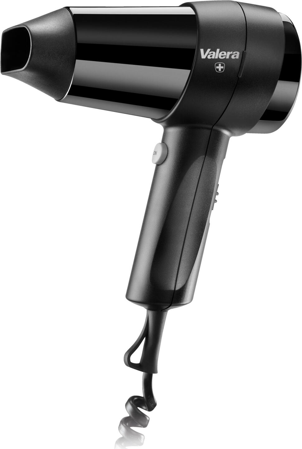 Valera Ligo Electric SA Hotel hairdryer Action 1200 Push Hotelföhn Action 1200 Push Hotel hairdryer Action 1200 Push; 17.7x23.5x8.6 cm (WxHxD); black Hotelföhn Action 1200 Push; 17.7x23.5x8.6 cm (BxHxT); schwarz The Valera Action 1200 Push is a compact and reliable hotel hairdryer that is ideal for guest rooms and guest bathrooms. With 1200 W of power, it offers efficient drying with energy-saving operation, making it a practical solution for hotels, guest houses and guest accommodation. The hairdryer is classically operated via a socket and does not require a wall bracket or fixed installation. This means it can be used flexibly in the guest bathroom. An on/off push switch directly on the appliance ensures simple and intuitive operation for hotel guests. Various air flow and heat settings can be selected via a sliding button with 2 fan stages and 3 temperature stages. The integrated cooling level (Cool) is ideal for fixing the hairstyle after styling. The tried-and-tested SECURITY corrugated wire heating element ensures even heat distribution and high operational safety. A flexible spiral cable offers additional freedom of movement in the guest bathroom, while the ondulating nozzle precisely focuses the air flow. Thanks to its robust construction and proven Swiss Made quality from Valera, the Action 1200 Push is a durable and functional solution for everyday use in hotels. Features: * Compact hotel hair dryer with 1200 W power * Energy-saving operation - ideal for hotels and guest rooms * Push on/off switch directly on the appliance * Operation via socket - no wall bracket required * 2 fan settings and 3 temperature settings for customised styling * Cooling stage (Cool) for fixing the hairstyle * SECURITY corrugated wire heating element for even heat distribution * Coiled cable for flexible use * Ondulating nozzle for precise airflow * Robust Swiss-made quality for daily use Der Valera Action 1200 Push ist ein kompakter und zuverlässiger Hotel-Haartrockner, der sich ideal für Gästezimmer und Gästebäder eignet. Mit 1200 W Leistung bietet er effizientes Trocknen bei gleichzeitig stromsparendem Betrieb, was ihn zu einer praktischen Lösung für Hotels, Pensionen und Gästeunterkünfte macht. Der Haartrockner wird klassisch über eine Steckdose betrieben und benötigt keine Wandhalterung oder feste Installation. Dadurch lässt er sich flexibel im Gästebad einsetzen. Ein Ein-/Aus-Druckschalter (Push-Schalter) direkt am Gerät sorgt für eine einfache und intuitive Bedienung für Hotelgäste. Über eine Schiebetaste mit 2 Lüfterstufen und 3 Temperaturstufen können verschiedene Luftstrom- und Wärmeeinstellungen gewählt werden. Die integrierte Abkühlstufe (Cool) eignet sich ideal, um die Frisur nach dem Styling zu fixieren. Das bewährte SECURITY-Welldrahtheizelement sorgt für gleichmäßige Wärmeverteilung und hohe Betriebssicherheit. Ein flexibles Spiralkabel bietet zusätzliche Bewegungsfreiheit im Gästebad, während die Ondulierdüse den Luftstrom präzise bündelt. Dank robuster Bauweise und der bewährten Swiss-Made-Qualität von Valera ist der Action 1200 Push eine langlebige und funktionale Lösung für den täglichen Einsatz im Hotel. Features: * Kompakter Hotel-Haartrockner mit 1200 W Leistung * Stromsparender Betrieb – ideal für Hotels und Gästezimmer * Ein-/Aus-Druckschalter (Push) direkt am Gerät * Betrieb über Steckdose – keine Wandhalterung erforderlich * 2 Lüfterstufen und 3 Temperaturstufen für individuelles Styling * Abkühlstufe (Cool) zum Fixieren der Frisur * SECURITY-Welldrahtheizelement für gleichmäßige Wärmeverteilung * Spiralkabel für flexible Nutzung * Ondulierdüse für präzise Luftführung * Robuste Swiss-Made-Qualität für den täglichen Einsatz