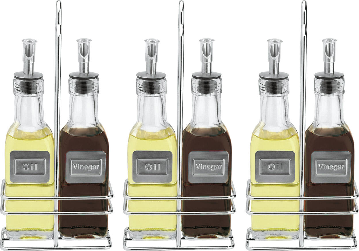 PULSIVA LUSINI Solutions GmbH Value pack cruet set Belcanto Vorteilspack Menage Belcanto Value pack cruet set Belcanto; 170 ml, 10.5x23.5x5.5 cm (WxHxD); silver/transparent; 3 set / pack Vorteilspack Menage Belcanto; 170 ml, 10.5x23.5x5.5 cm (BxHxT); silber/transparent; 3 Set(s) / Pack Value pack with 3 cruet sets consisting of chrome-plated metal frame, vinegar dispenser and oil dispenser. Hygienically sealable with rubber stopper. Metal plates with matching inscription. Cruet: suitable for dishwasher. Vorteilspack mit 3 Menagen-Sets bestehend aus verchromtem Metallgestell, Essigspender und Ölspender. Hygienisch verschließbar durch Gummistöpsel. Metallschilder mit passender Aufschrift. Menage: Spülmaschinengeeignet.