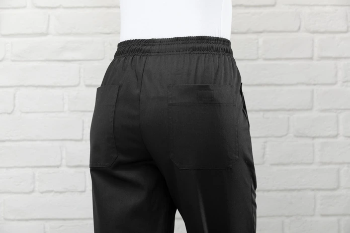 PULSIVA LUSINI Solutions GmbH Women's chef trousers Liam Damen Kochhose Liam Women's chef trousers Liam; Size 38; black Damen Kochhose Liam; Kleidergröße 38; schwarz 65 % polyester, 35 % cotton. 200 g/m². 60 °C wash. Solid, practical women's chef trousers made of easy-care, smooth fabric. Back with two patch pockets, two side pockets, flexible elastic waistband with internal cord for optimal width adjustment. Comfortable, straight cut with comfortable fit. Inside leg length: 78 cm for size 36. 65 % Polyester, 35 % Baumwolle. 200 g/m². 60°-Wäsche. Solide, praktische Damenkochhose aus pflegeleichtem, glattem Gewebe. Rückenteil mit zwei aufgesetzten Taschen, zwei seitliche Eingriffstaschen, flexibler Gummibund mit innenliegender Kordel zur optimalen Weitenregulierung. Komfortabler, gerader Schnitt mit bequemer Passform. Innenbeinlänge: 78 cm in Gr 36