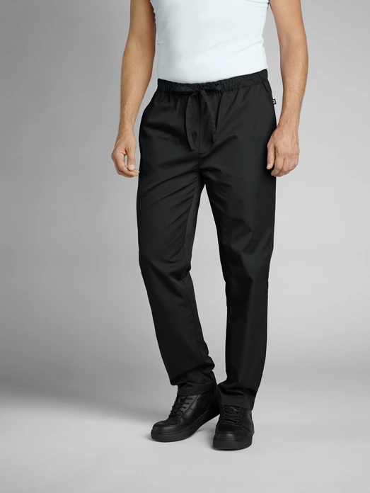 JOBELINE LUSINI Solutions GmbH Men's chef trousers Vito Herren Kochhose Vito Men's chef trousers Vito; Size M; black Herren Kochhose Vito; Kleidergröße M; schwarz 65% polyester, 35% cotton. 150 g/m². 60°C wash. Men's chef trousers with fully elasticated waistband, made from an extra-light and breathable fabric. With side pockets, two patch back pockets and ties at the waistband to adjust and fix the waist size. Comfortable, loose fit with slightly tapered trouser legs. Inside leg length: 80 cm for size M. 65 % Polyester, 35 % Baumwolle. 150 g/m². 60°-Wäsche. Herrenkochhose mit vollelastischem Dehnbund, aus einem extraleichten und atmungsaktiven Gewebe. Mit seitlichen Eingriffstaschen, zwei aufgesetzten Gesäßtaschen, sowie Bändern am Schlupfbund zur Regulierung und Fixierung der Taillenweite. Bequeme lockere Passform, mit nach unten hin leicht zulaufendem Hosenbein. Innenbeinlänge: 80 cm in Gr. M