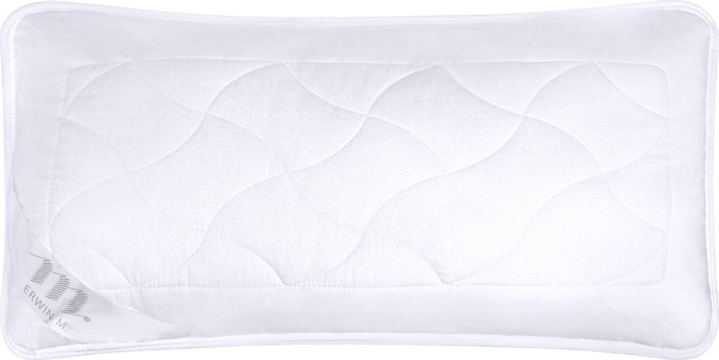 ERWIN M. LUSINI Solutions GmbH Pillow Dream Cotton fibre Kissen Dream Cotton Faser Pillow Dream Cotton fibre; 40x80 cm (WxL); white Kissen Dream Cotton Faser; 40x80 cm (BxL); weiß ##Dream Cotton pillow - Proven classic with cotton cover The Dream Cotton pillow combines a high-quality polyester hollow fibre filling with a breathable cotton fabric cover. The fluffy, yet pleasantly supportive filling ensures a balanced sleeping climate and comfortably supports the head and neck. The smooth cotton fabric offers a pleasant lying sensation and increases sleeping comfort. The pillow also offers excellent value for money and is machine washable - ideal for allergy sufferers. The cigarette annealing test in accordance with EN ISO 12952-1 guarantees additional safety and tested quality. * Filling: 100 % polyester hollow fibre * Cover: 100 % cotton fabric * Pleasant, gentle support for head and neck * Breathable, fluffy and dimensionally stable * Machine washable and allergy-friendly * Very good price-performance ratio * Cigarette annealing test in accordance with EN ISO 12952-1 for tested quality Care instructions: Do not use chlorine when washing, as this damages the fibres and causes the filling to clump together. ##Kissen Dream Cotton – Bewährter Klassiker mit Baumwollbezug Das Kissen Dream Cotton kombiniert eine hochwertige Füllung aus Polyester?Hohlfaser mit einem atmungsaktiven Bezug aus Baumwollgewebe. Die bauschige, zugleich angenehm stützende Füllung sorgt für ein ausgewogenes Schlafklima und unterstützt Kopf und Nacken komfortabel. Das glatte Baumwollgewebe bietet ein angenehmes Liegegefühl und erhöht den Schlafkomfort. Das Kissen überzeugt zudem durch ein sehr gutes Preis?Leistungsverhältnis und ist maschinenwaschbar – ideal für Allergiker. Der Zigarettenglühtest nach EN ISO 12952?1 gewährleistet zusätzliche Sicherheit und geprüfte Qualität. * Füllung: 100 % Polyester?Hohlfaser * Bezug: 100 % Baumwollgewebe * Angenehme, sanfte Stützkraft für Kopf und Nacken * Atmungsaktiv, bauschig und formstabil * Maschinenwaschbar und allergikerfreundlich * Sehr gutes Preis?Leistungsverhältnis * Zigarettenglühtest nach EN ISO 12952?1 für geprüfte Qualität Pflegehinweis: Beim Waschen kein Chlor verwenden, da dies die Fasern beschädigt und zum Verklumpen der Füllung führt.