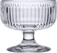 La Rochere Ice cream bowl Tahiti Eisbecher Tahiti Glasschale Ice cream bowl Tahiti ; 230 ml, 10 cm (Ø); transparent; 6 piece / pack Eisbecher Tahiti Glasschale; 230 ml, 10 cm (Ø); transparent; 6 Stück / Pack The Tahiti ice cream bowl from La Rochère has been specially developed for professional use in the catering, hospitality and ice cream parlour sectors. Its compact shape, robust construction and practical stackability make it the ideal choice for businesses with high customer footfall. With a capacity of 230 ml, the glass bowl is perfect for classic ice cream sundaes, frozen yoghurt, sorbets, desserts, fruit combinations or small sweet treats. The distinctive ribbed texture gives the dessert glass a modern look whilst ensuring it feels pleasant to the touch. Made from durable pressed glass, the Tahiti range impresses with its high suitability for everyday use. The glass is dishwasher-safe, durable and designed for intensive use in the hospitality sector. Thanks to their stackable design, the ice cream bowls can be stored to save space – a key advantage in professional kitchens, cafés and ice cream parlours. They are manufactured in France by La Rochère, Europe’s oldest glass manufacturer still in operation. The clean lines of the design put ice cream and dessert creations centre stage and ensure an appealing presentation at the table or in the display case. Whether for daily service or seasonal dessert menus – the Tahiti ice cream bowl combines functionality with French glassmaking artistry. Capacity: 230 ml Stackable for space-saving storage Sturdy pressed glass for professional use Dishwasher-safe Ideal for ice-cream parlours, cafés, restaurants and hotels Made in France Der Eisbecher Tahiti von La Rochère wurde speziell für den professionellen Einsatz in Gastronomie, Hotellerie und Eisdielen entwickelt. Seine kompakte Form, die robuste Verarbeitung und die praktische Stapelbarkeit machen ihn zur idealen Wahl für Betriebe mit hohem Gästeaufkommen. Mit einem Fassungsvermögen von 230 ml eignet sich die Glasschale perfekt für klassische Eisbecher, Frozen Yogurt, Sorbets, Desserts, Obstvariationen oder kleine Nachspeisen. Die markante gerippte Struktur verleiht dem Dessertglas eine moderne Optik und sorgt gleichzeitig für eine angenehme Haptik. Gefertigt aus widerstandsfähigem Pressglas überzeugt die Tahiti-Serie durch ihre hohe Alltagstauglichkeit. Das Glas ist spülmaschinengeeignet, langlebig und für den intensiven Einsatz im Horeca-Bereich ausgelegt. Dank der stapelbaren Ausführung lassen sich die Eisbecher platzsparend lagern – ein entscheidender Vorteil in professionellen Küchen, Cafés und Eiscafés. Die Herstellung erfolgt in Frankreich durch La Rochère, die älteste noch aktive Glasmanufaktur Europas. Die klare Formgebung rückt Eis- und Dessertkreationen in den Mittelpunkt und unterstützt eine ansprechende Präsentation am Tisch oder in der Auslage. Ob für den täglichen Service oder saisonale Dessertkarten – der Tahiti Eisbecher verbindet Funktionalität mit französischer Glaskunst. Inhalt: 230 ml Stapelbar für platzsparende Lagerung Robustes Pressglas für den professionellen Einsatz Spülmaschinengeeignet Ideal für Eisdielen, Cafés, Restaurants und Hotels Made in France