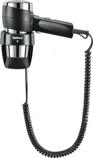 Valera Ligo Electric SA Hotel hairdryer Action Super Plus 1200 Hotelföhn Action Super Plus 1200 Hotel hairdryer Action Super Plus 1200; 25x11.5x11.5 cm (WxHxD); black Hotelföhn Action Super Plus 1200; 25x11.5x11.5 cm (BxHxT); schwarz The Valera Action Super Plus 1200 is a compact and reliable hotel hairdryer with wall bracket that has been specially developed for guest rooms and guest bathrooms. With 1200 W power, it ensures efficient drying and convenient operation in everyday hotel use. The wall bracket is permanently connected to the electrical circuit (direct connection) and enables safe, permanent installation in the guest bathroom - without the need for a Euro plug or separate socket. The hairdryer is electrically connected to the holder and ready for use at any time. The hairdryer has an on/off pressure switch directly on the appliance and an on/off safety switch on the wall bracket, allowing guests to operate the appliance intuitively. Up to six air flow and temperature combinations can be set using a sliding button with 2 fan stages and 3 temperature stages. The cooling level (Cool) is ideal for fixing the hairstyle. The SECURITY corrugated wire heating element ensures even heat distribution and high operational safety. A flexible spiral cable allows comfortable freedom of movement, while the ondulating nozzle focuses the airflow in a targeted manner. Thanks to its robust construction and Swiss Made quality from Valera, the Action Super Plus 1200 is a durable solution for hotels, guesthouses and guest suites. Features: * Compact hotel hair dryer with wall bracket * 1200 W power for reliable drying * Direct connection to the power supply via permanently installed wall bracket * On/off push button on the appliance * On/off safety switch on the wall bracket * 2 fan stages and 3 temperature stages (6 switching combinations) * Cooling level (Cool) to fix the styling * SECURITY corrugated wire heating element for even heat * Coiled cable for flexible use in the guest bathroom * Ondulating nozzle for precise airflow * Robust Swiss-made quality for long-term hotel use Der Valera Action Super Plus 1200 ist ein kompakter und zuverlässiger Hotel-Haartrockner mit Wandhalterung, der speziell für Gästezimmer und Gästebäder entwickelt wurde. Mit 1200 W Leistung sorgt er für effizientes Trocknen und komfortable Bedienung im täglichen Hotelbetrieb. Die Wandhalterung wird fest an den Stromkreis angeschlossen (Direktanschluss) und ermöglicht eine sichere, dauerhafte Installation im Gästebad – ganz ohne Eurostecker oder separate Steckdose. Der Haartrockner ist elektrisch mit der Halterung verbunden und jederzeit einsatzbereit. Der Föhn verfügt über einen Ein-/Aus-Druckschalter direkt am Gerät sowie einen Ein-/Aus-Sicherheitsschalter an der Wandhalterung, wodurch Gäste das Gerät intuitiv bedienen können. Über eine Schiebetaste mit 2 Lüfterstufen und 3 Temperaturstufen lassen sich bis zu sechs Luftstrom- und Temperaturkombinationen einstellen. Die Abkühlstufe (Cool) eignet sich ideal zum Fixieren der Frisur. Das SECURITY-Welldrahtheizelement sorgt für gleichmäßige Wärmeverteilung und hohe Betriebssicherheit. Ein flexibles Spiralkabel ermöglicht komfortable Bewegungsfreiheit, während die Ondulierdüse den Luftstrom gezielt bündelt. Dank robuster Bauweise und Swiss-Made-Qualität von Valera ist der Action Super Plus 1200 eine langlebige Lösung für Hotels, Pensionen und Gästesuiten. Features: * Kompakter Hotel-Haartrockner mit Wandhalterung * 1200 W Leistung für zuverlässiges Trocknen * Direktanschluss an die Stromversorgung über fest installierte Wandhalterung * Ein-/Aus-Druckschalter (Push) am Gerät * Ein-/Aus-Sicherheitsschalter an der Wandhalterung * 2 Lüfterstufen und 3 Temperaturstufen (6 Schaltkombinationen) * Abkühlstufe (Cool) zum Fixieren des Stylings * SECURITY-Welldrahtheizelement für gleichmäßige Wärme * Spiralkabel für flexible Nutzung im Gästebad * Ondulierdüse für präzise Luftführung * Robuste Swiss-Made-Qualität für den Hotel-Dauereinsatz