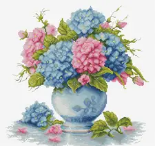 Set de brodat în cruciuliță Dimensiunea broderiei: 10.19 x 10.00 in sau 26 x 26 cm Numărul de cruciulițe: 163 x 160 Culori: 34 Ață: Luca-S 100% bumbac Pânză: Zweigart Aida16 ct. (100/101) 40 x 40 cm Ace de brodat №26 - 2 ace Diagramă parțial colorată și contur colorat - 6 foi format A3 Nivel de dificultate: 3/5 Artist: Luca-S Set de brodat în cruciuliță Luca-S Set de brodat în cruciuliță Luca-S - Vaza cu Hortensie, B7033